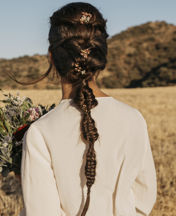 back-view-bride-holding-flowers-bouquet